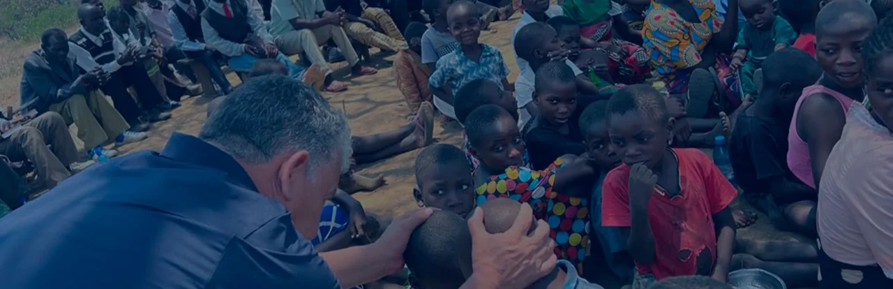 A pastor praying for Africa